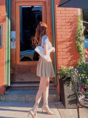 Beige Pleated Mini Skirt with White Top